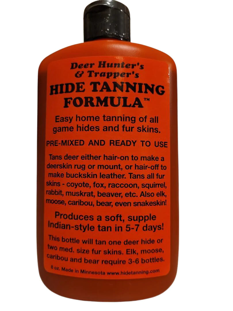 Bottle of Hide Tanning Formula with Two Pelt Fleshers / Scrapers