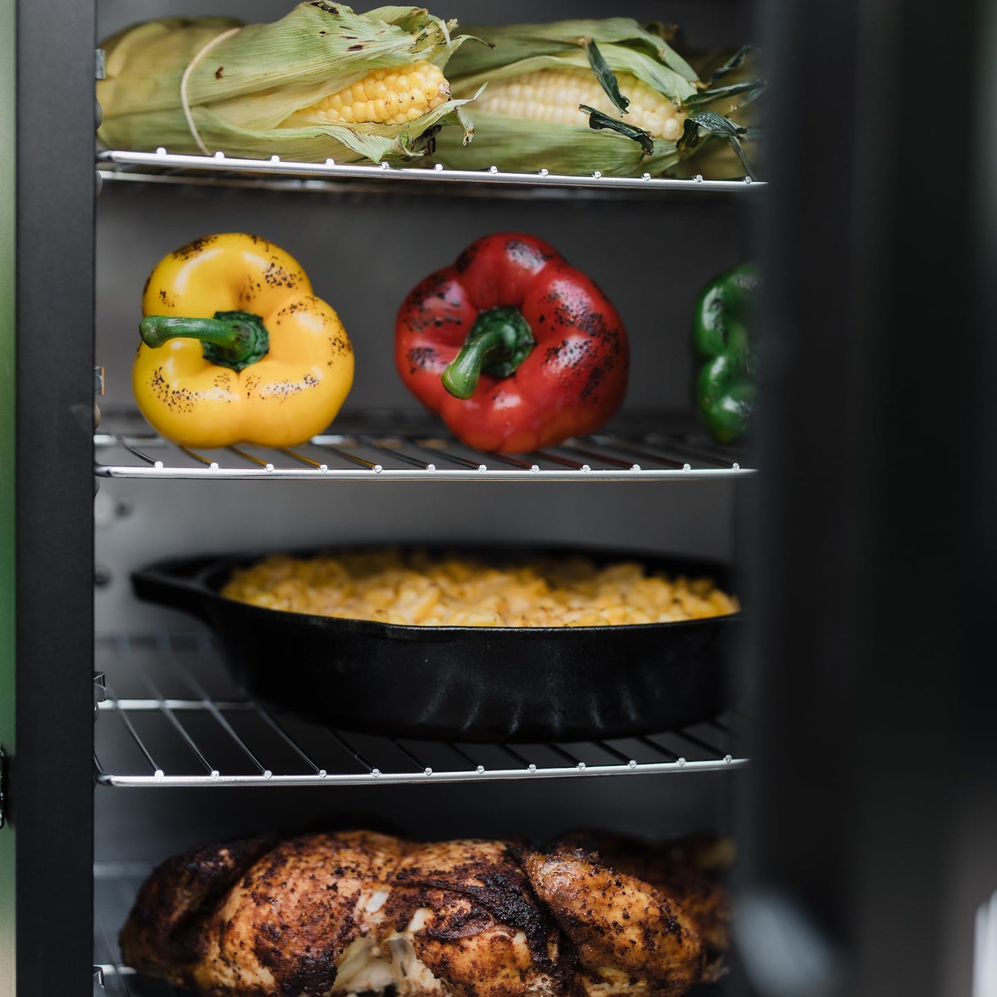 Masterbuilt® 30-inch Digital Electric Vertical BBQ Smoker with Leg Kit, Side Wood Chip Loader and 710 Cooking Square Inches in Black, Model MB20070421