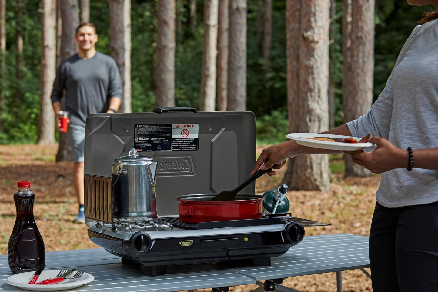 Coleman Tabletop 2-in-1 Grill & Stove with 2 Adjustable Burners, Propane Grill/Stove with Push-Button Starter, Wind Guards, Grease Tray, & 20,000 BTUs of Power for Camping, Tailgating, & More