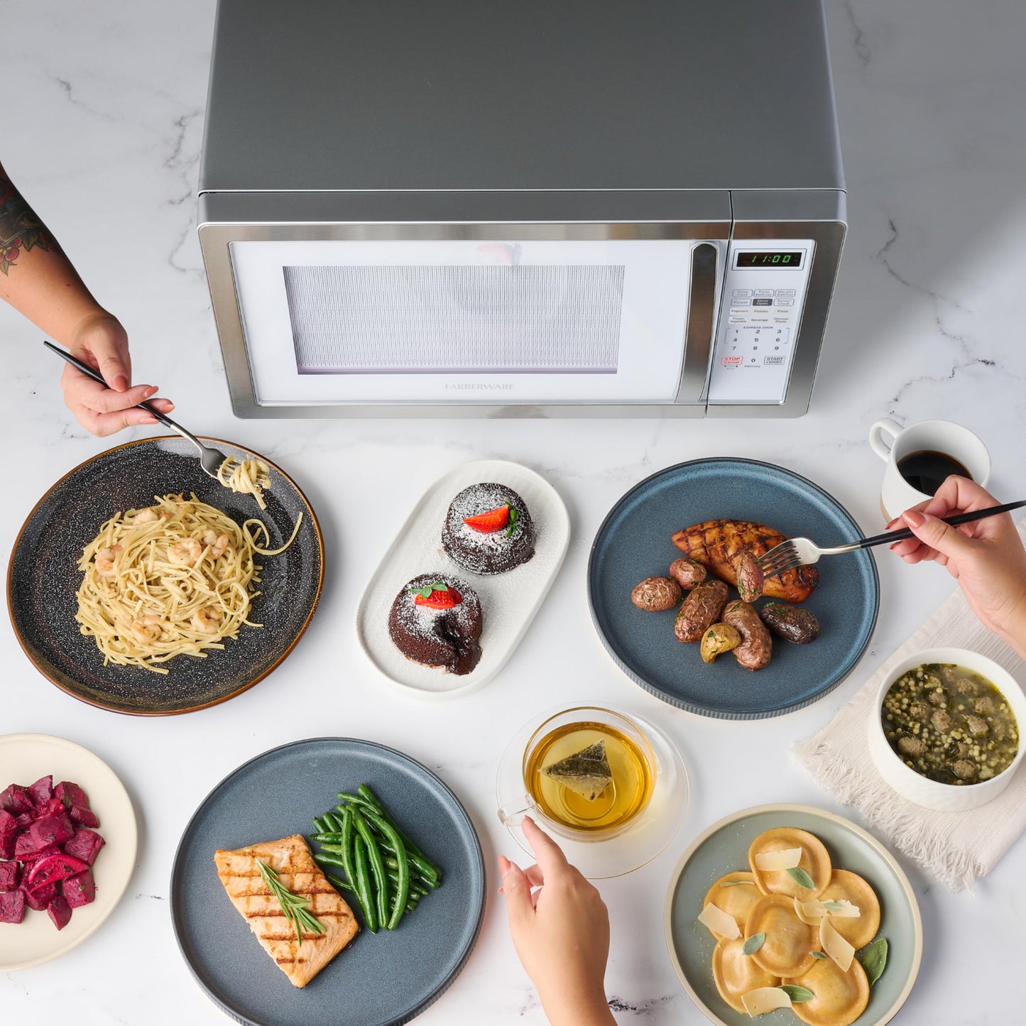 Farberware Countertop Microwave 700 Watts, 0.7 Cu. Ft. - Microwave Oven With LED Lighting and Child Lock - Perfect for Apartments and Dorms - Easy Clean Stainless Steel