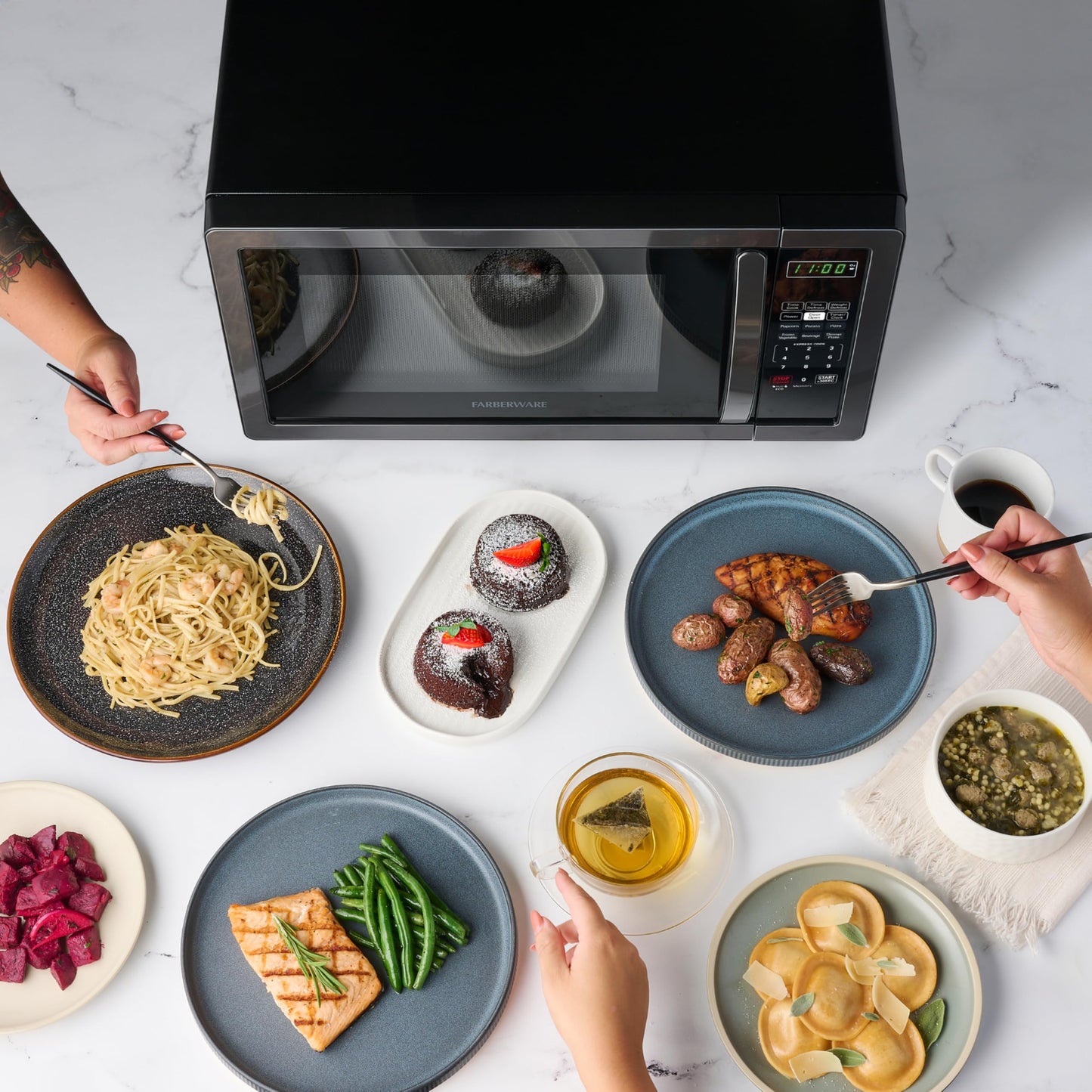 Farberware Countertop Microwave 700 Watts, 0.7 Cu. Ft. - Microwave Oven With LED Lighting and Child Lock - Perfect for Apartments and Dorms - Easy Clean Stainless Steel