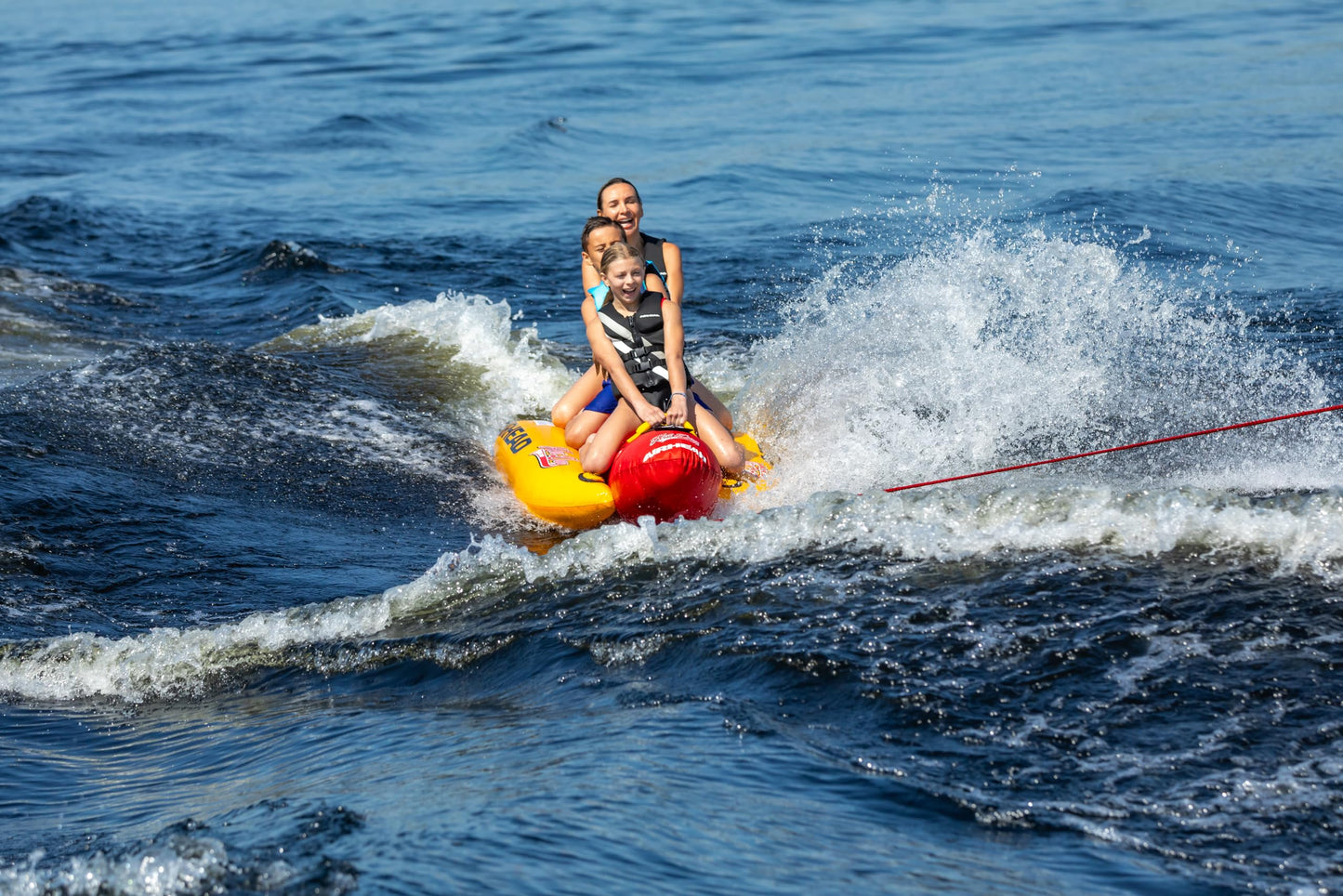 Airhead Hot Dog Towable, 1-3 Rider Tube for boating and Water Sports, Neoprene Seat Pads, Double-Stitched Full Nylon Cover, and Boston Valve for Convenient Inflating and Deflating